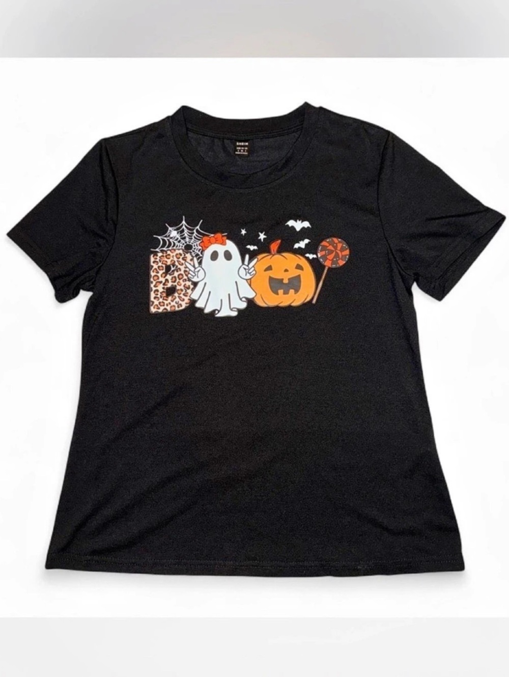 SHEIN Halloween Ghost Holding Pumpkin Lollipop Graphic Print T-Shirt Pumpkin